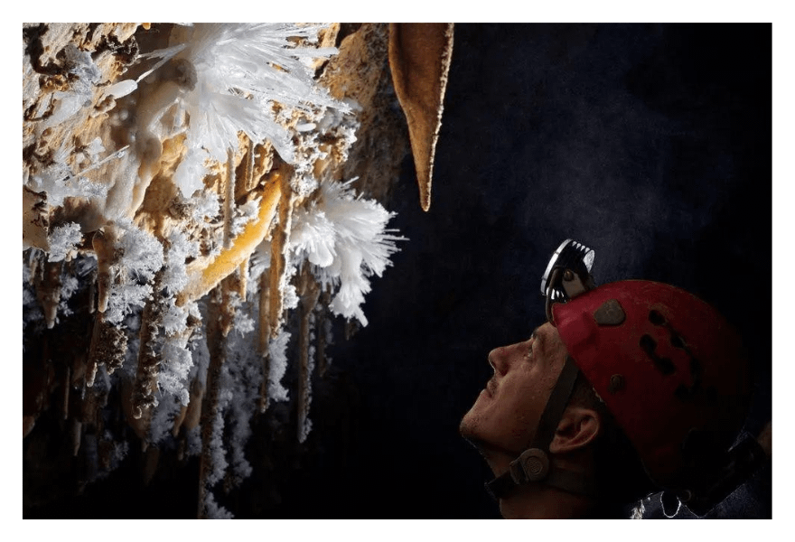 PESH-cavers-sitting-deep-in-cave